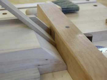 closeup of mitering a piece of cherry